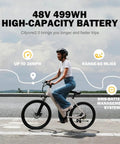 Woman riding Cityone 2.0 Electric Bike For Adults Who Wanna Cruise 65 Mile Range, 28 MPH Top Speed, highlighting 48V 499Wh battery