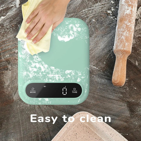 Chef Grade Digital Food Scale For Kitchen, 11lb Capacity With 0.01oz/1g Precision, being cleaned with a cloth