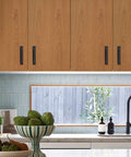 Installed view of kitchen cabinets with Four Pack Barn Door Handles Black Zinc Alloy Sliding Door Pulls with Plate.
