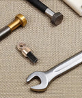 Grandfather Clock Weight Replacement Kit with vintage shell hanging hook and M6 nut set for floor clocks on fabric surface
