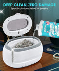 Ultra Strong 32 Oz Ultrasonic Jewelry Cleaner Solution pouring into cleaner with silver jewelry inside on a table.