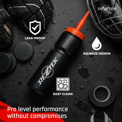 Hockey Hydration Bottle With Long Spout For Fast Sips 25 Oz Bio Based Plastic Sports Bottle on wet surface with gear