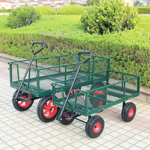 Two green Beefy All Terrain Utility Cart Heavy Duty Garden Trailers with mesh sides, 10-inch wheels, parked on a paved path.