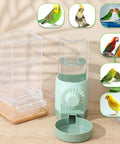 No Sweat Bird Feeder And Water Dispenser Set For Parrot Cages Comes With Two Seed Pots And Two Drinkers To Catch Spills And Keep Your Cage Crisp Featuring A Slick Green Medium Package with clear acrylic feeder and green water dispenser.