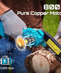 Man using Six Inch Cordless Mini Chainsaw With Two Batteries Portable Electric Chainsaw For Tree Trimming And Wood Cutting Beast