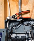 8 Inch Pro Series Diagonal Cutting Pliers with Dual Material Grips on electrical panel, showing induction hardened edges for tough wire jobs.