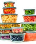 Stacked 24 Piece Glass Food Storage Set With Airtight Lids, Leakproof BPA Free Meal Prep Containers filled with fruits and vegetables.