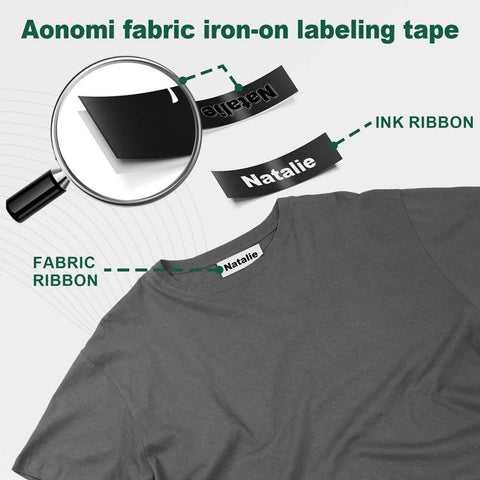 Close-up of black on white half inch fabric iron on label tape applied to a gray shirt with magnified view, part of a 3-pack set.