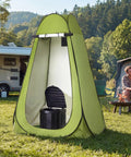 Grab And Go Portable Camping Toilet Kit With Pop Up Privacy Tent in campsite with RV and campfire in background
