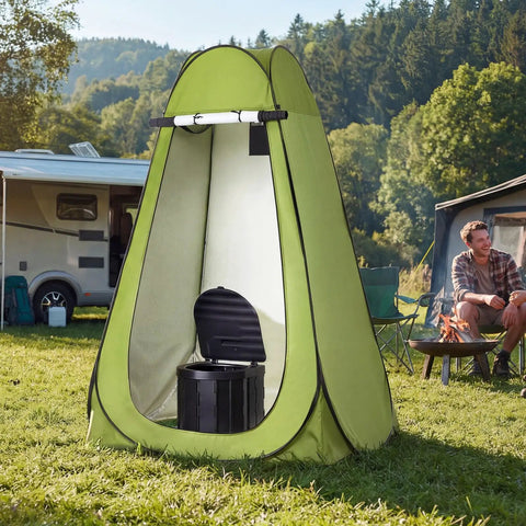 Grab And Go Portable Camping Toilet Kit With Pop Up Privacy Tent in campsite with RV and campfire in background