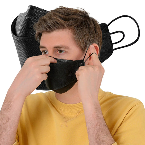 A man wearing an 11 Piece Black KF94 Protective Face Masks for Adults with 4 Layer Filter and 3D Design, Adjustable Ear Straps.