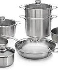 Dope 12 Piece Stainless Steel Cookware Set With Lids And Steamer displayed with pots, pans, and steamers, perfect for soups and pasta.