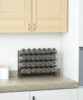 No Sweat Pantry Setup Four Tier Spice Rack Organizer With 28 Square Glass Jars And Complete Label Kit Funnel Set For Cabinet Wall Mount Black Steel Kitchen Storage on countertop.