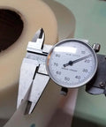 Caliper measuring 4 Inch By Point Zero One Five Inch By 100 Foot Urethane Die Protection Film For Press Brake Protects Stainless Steel And Painted Parts