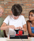Children using 4-In-1 Woodworking Kit For Kids Ages 8 And Up Lathe Drill Sander And Saw STEM DIY Project Tool Set For Young Makers