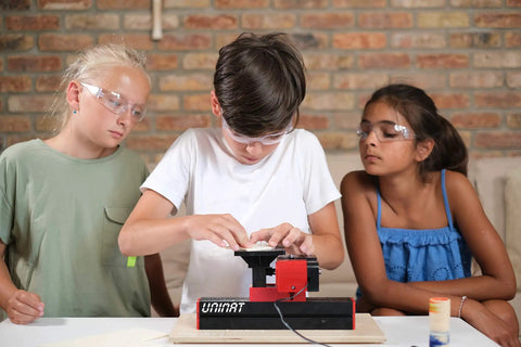 Children using 4-In-1 Woodworking Kit For Kids Ages 8 And Up Lathe Drill Sander And Saw STEM DIY Project Tool Set For Young Makers