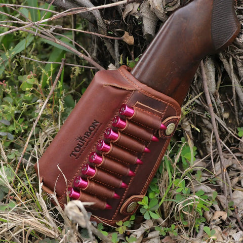 Genuine Leather Buttstock Cheek Rest With Rifle Shell Holder and Quick Access Ammo Slot attached on rifle butt in outdoors