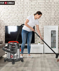 Person using Stainless Steel 4 Gallon Wet Dry Shop Vacuum With Lightweight Portable Design Beast Power 4 HP Motor in living room