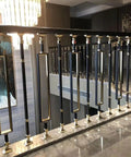 Game Changing Black And Gold Aluminum Stair Balusters Featuring 270 Degree Adjustable Brackets For Easy Indoor Or Outdoor Railing Projects No Sweat Installation Weather Resistant Spindles 20 Pack, detailed view of balusters on indoor railing.