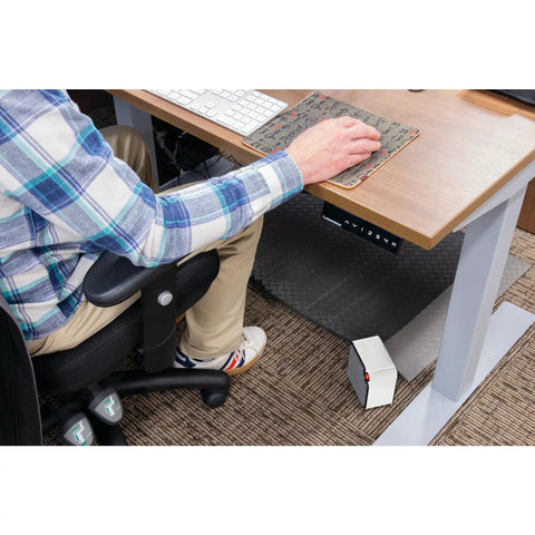 Desk-Friendly 250W Personal Space Heater For Desks And Small Rooms placed under a desk, compact and energy saving design