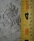 303 Stainless Steel Dowel Pins 1/32 Inch OD By 3/16 Inch Long Pack Of 25 For Multi Purpose Hardware Fastener Kit High Strength And Corrosion Resistant For DIY Projects And Harsh Environments, measured beside ruler