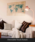 Living room setup with pastel pink Zoey LED Floor Lamp With Built In Dimmer Flexible Stand Up Task Light for kids rooms and desks.
