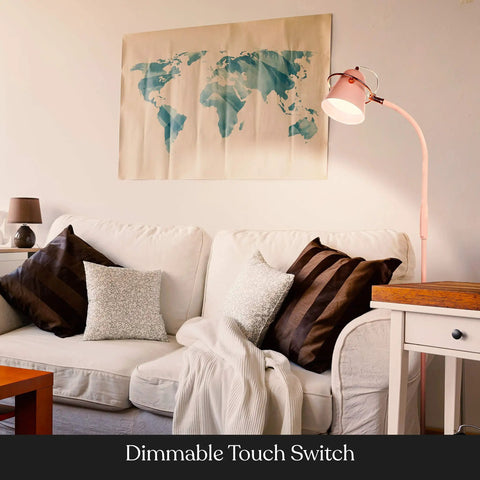 Living room setup with pastel pink Zoey LED Floor Lamp With Built In Dimmer Flexible Stand Up Task Light for kids rooms and desks.
