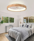 24 Inch Wood Fandelier Ceiling Fan With Integrated Light Flush Mount Frame in a modern bedroom with gray bedding.