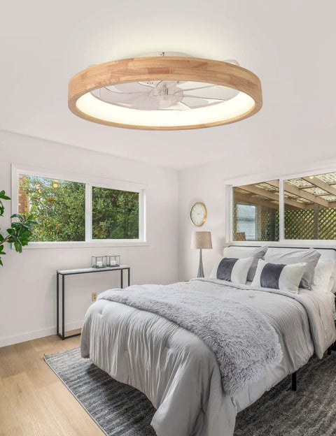 24 Inch Wood Fandelier Ceiling Fan With Integrated Light Flush Mount Frame in a modern bedroom with gray bedding.