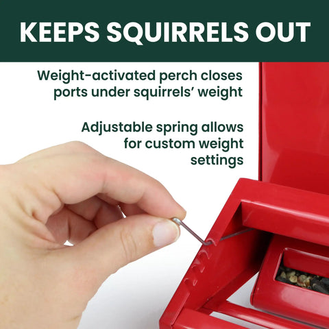 Hand adjusting weight setting on Country House Squirrel Proof Bird Feeder With Weathervane 8 Lb Seed Capacity All Metal Durable Construction.