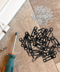 Rock Solid Heavy Duty 30 Piece Invisible Cabinet Connector Set Featuring 2 In 1 Iron Hidden Joint Fasteners on wooden surface.