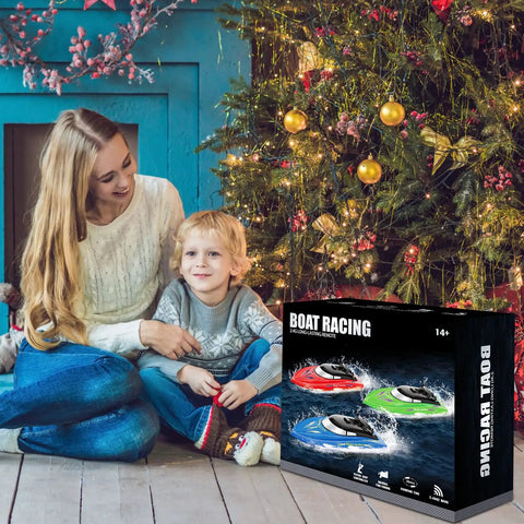 Box of 4 Pack Remote Control Boats for Kids and Adults under a Christmas tree, featuring fast high-speed RC boats for pools and lakes.