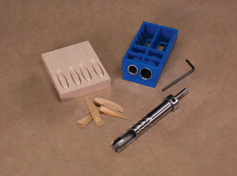 Badass Heavy Duty Custom Plug Cutting Bit For XL Pocket Hole Jigs Rock Solid Woodworking Joinery Tool Kpc1060 Replacement Drill Bit and accessories on table.