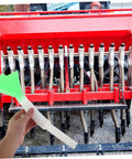 Hand holding Adjustable Seed Tube Kit For Wheat And Corn, Built To Last Sturdy Plastic Seeder Tube, Easy Installation