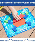Child playing with Floating Underwater Dive Set for Pool and Beach Fun; colorful crab-shaped puzzle piece on wooden deck