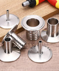 1.5 Inch Tri Clamp To Hose Barb Adapter, Wicked Strong Sus304 Stainless Steel Sanitary Fitting, Badass Connector For Home Brew Beer Wine Distillation Setup, Heavy Duty Pipe Joiner Tool on wooden surface.