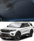 Heavy Duty Foldable Windshield Sun Shade Deflects Blazing Summer Heat And Keeps Your Ride Cool While Blocking Uv Rays So You Stay Comfy On Long Highway Drives Without Breaking A Sweat in use on a vehicle.