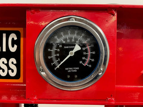 Heavy Duty High Capacity Dual Speed Hydraulic Shop Press pressure gauge showing metric and US tons for precise force measurement.