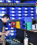 Technician working near 4 Stack LED Andon Tower Light With 8 ft 3 Prong Power Cord, Plug And Play, Off Steady Red Amber Green Blue Signals