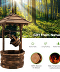 Rustic Wishing Well Outdoor Fountain With Electric Pump, freestanding wooden water feature with bucket in forest setting.