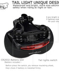 Underside view of C99 Memory Foam Bike Seat Saddle With Taillight highlighting LED lights, dual spring suspension, and switch.