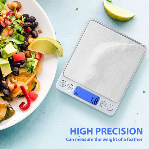 Rechargeable Kitchen Scale With Trays, Ultra Precise 3000g/0.1g Digital Food Scale next to a salad with lime garnish