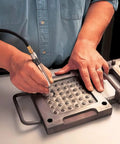 Big League Air Scribe Engraving Pen With Rolling Throttle And 13500 Blows Per Minute For Quick Marking On Metal Glass And Stone featuring precise etching on a metal surface.