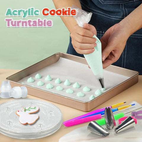 Acrylic Cookie Decorating Kit with turntable and piping bag creating mint green icing peaks on a tray.