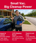 Person holding Wet Dry Shop Vac With 3 Gallon Tank And 2.0 Peak HP Motor in front of house, showcasing portable design