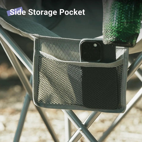 Side pocket of Ultralight Portable Folding Camping Chair For Adults With Cup Holder And Cooler Pouch, holding a smartphone.