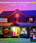 House with Lit Smart Curtain Lights 400 LED 6.6ft by 6.6ft Fairy String Lights displaying festive patterns, shown with app control on phone.