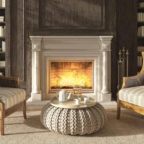 Elegant living room with lit fireplace, cozy armchairs, and decorative round table. Copper Reflective Fire Glass 10 Lbs For Propane Fire Pit One Half Inch Sparkly Fireplace Glass Rocks For Fire Pits And Tables With A Lit Multicolor Shine In Daylight Mesmerizing Fire Light At Night.
