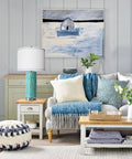 Contemporary living room with a white linen drum shade lamp on a side table, highlighting decor style and functionality.
