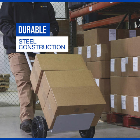 Person using heavy duty steel hand truck with 600 pound capacity and 10 inch flat free tires in a warehouse setting